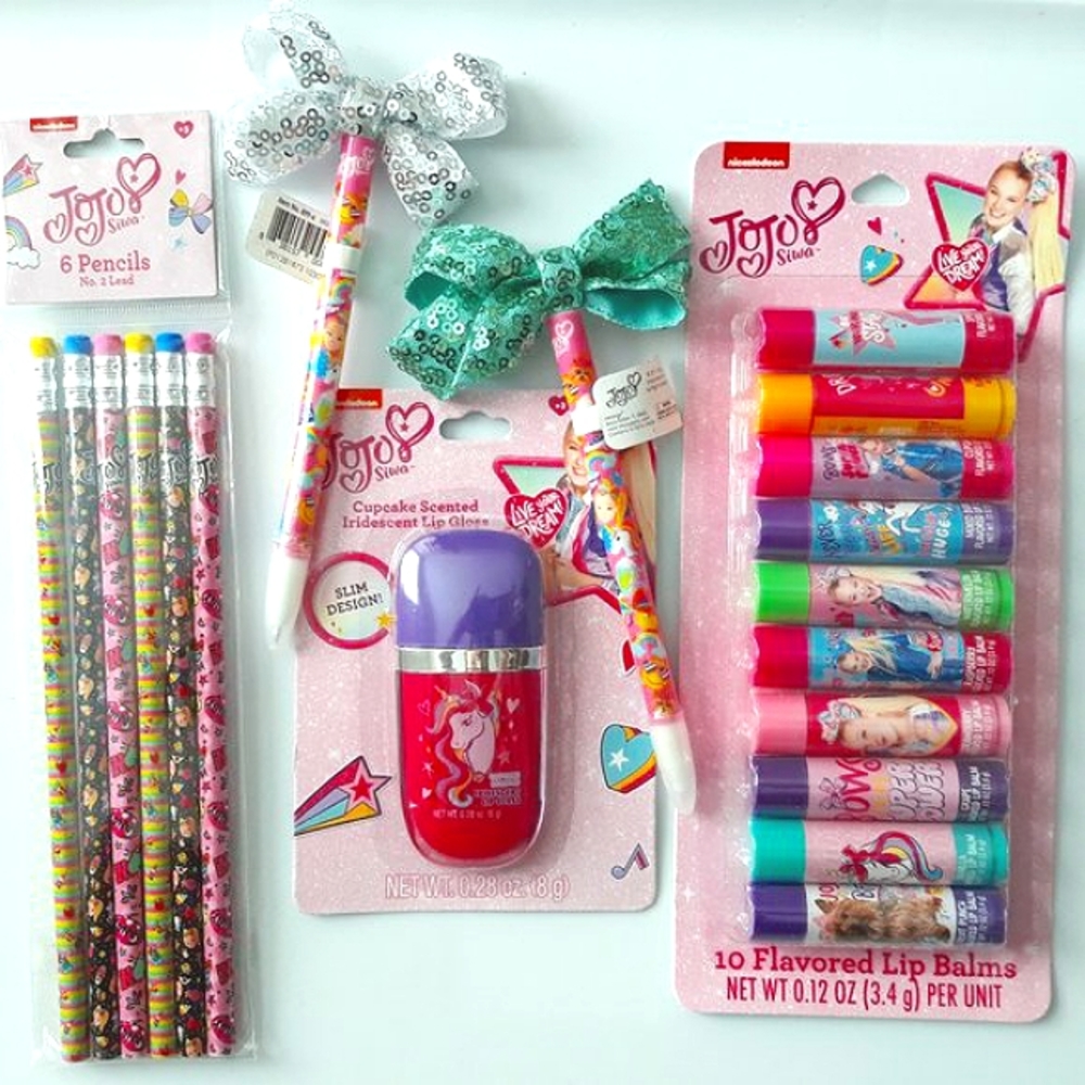 JoJo Siwa Lip Balm, Lip Gloss, Pen, and Pencil Set.
